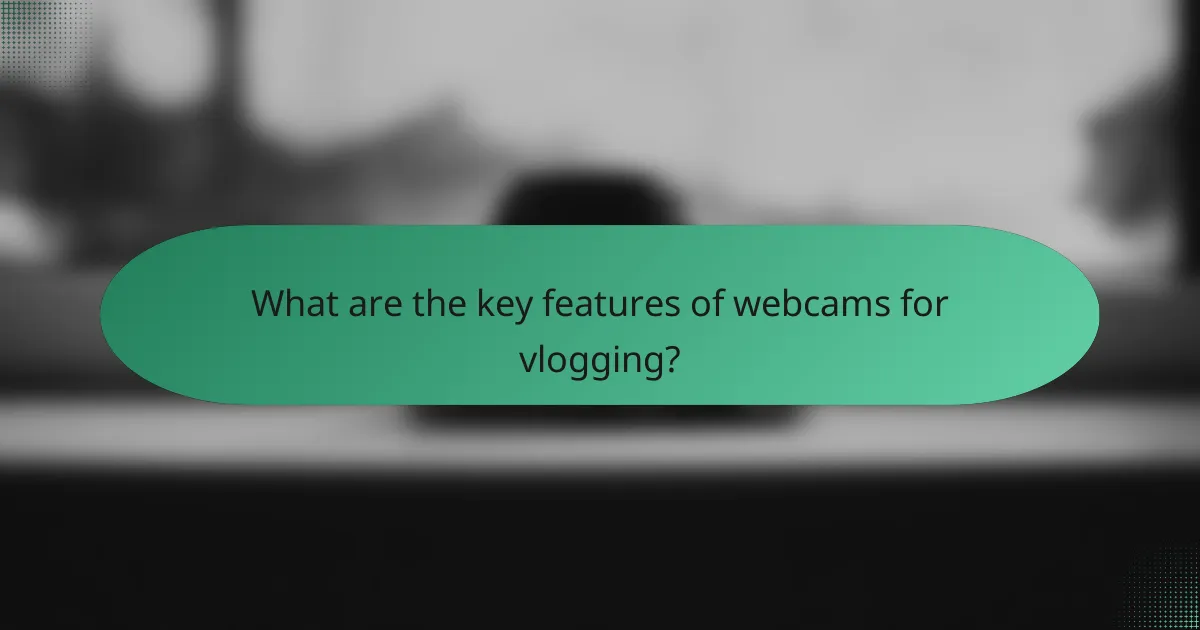 What are the key features of webcams for vlogging?